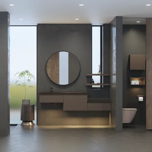 Stilvolle und geräumige Badezimmer Inspiration mit großem rundem Spiegel mit schwarzem Rahmen, dunklem Steinwaschbecken, farbigem WC, Oberschrank und offenem Regal in einem raffinierten und gedämpften Design