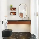 Moderne und stilvolle Badezimmer Inspiration mit ovalem Spiegel mit schwarzem Rahmen und Lichtsteuerung, farbigem WC, Waschtischunterschrank, Unterschränken und Schränken aus rotbrauner Eiche, Silestone-Waschbecken und passendem Boden