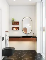 Moderne und stilvolle Badezimmer Inspiration mit ovalem Spiegel mit schwarzem Rahmen und Lichtsteuerung, farbigem WC, Waschtischunterschrank, Unterschränken und Schränken aus rotbrauner Eiche, Silestone-Waschbecken und passendem Boden