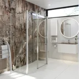 Inspiration für ein Badezimmer mit einer luxuriösen Duschkabine mit Schiebetür, weißen Badezimmermöbeln und einer Wand im Rohbau-Look, die dem Badezimmer einen rauen und urbanen Charakter verleiht