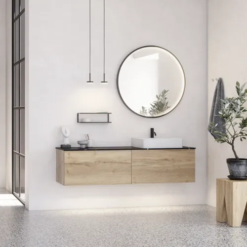 Großes urbanes Badezimmer mit Möbeln aus Eichenholz, Steinplatte mit quadratischem Becken, rundem Spiegel mit schwarzem Rand, Naturfarben und Terrakottaboden für einen industriellen und modernen Look